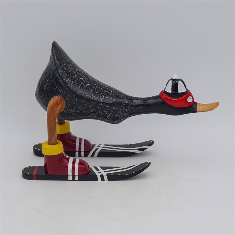 Duck »Fabian« - small, bent forward, dark grey with skis