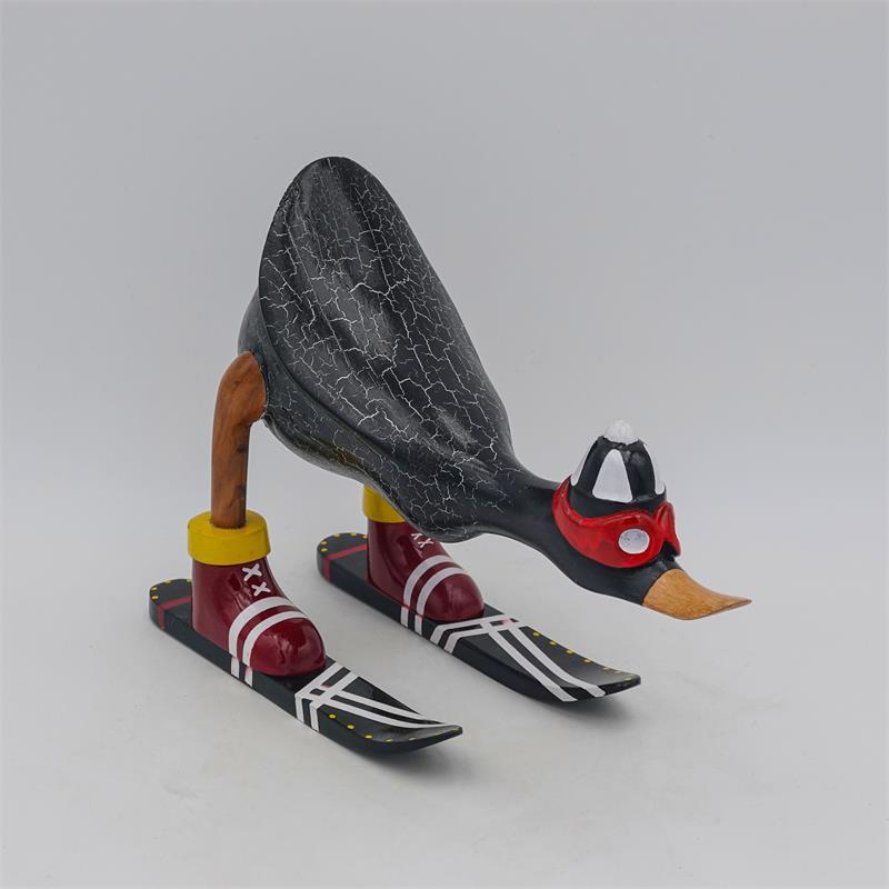 Duck »Fabian« - small, bent forward, dark grey with skis