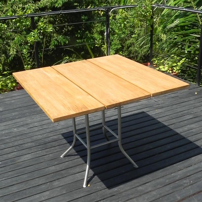 Table pliante Fides 100 x 100 x 75 cm teck vintage avec structure en acier inoxydable